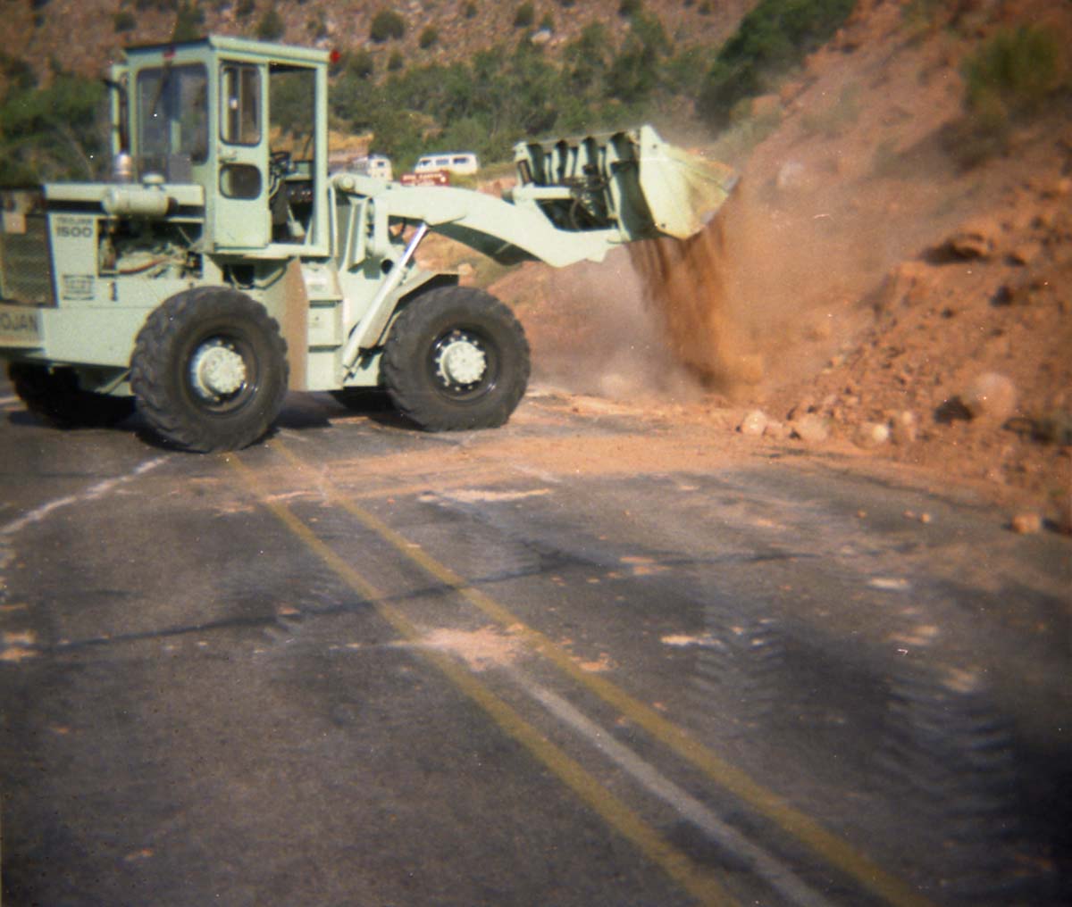 Color Photo of a rock slide near the junction of routes 1 and 2.