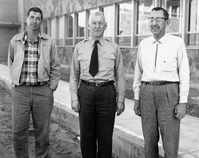 Incentive award winners standing outside park headquarters, left to right: Roy O. Curbow, Charles E. Humberger, Joseph O. McCabe.