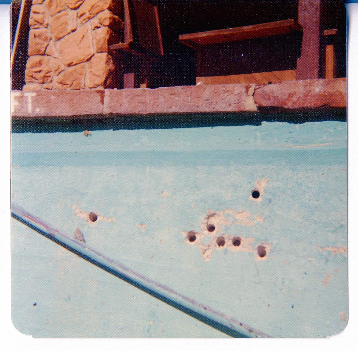 The destruction of the lodge pool and bathhouse.