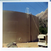 Repainting the exterior of the million gallon water tank at Birch Creek.