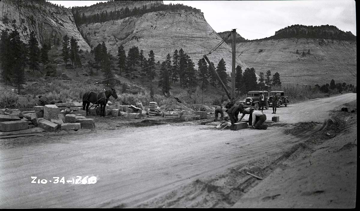 East Entrance Station - checking house construction, workers with horses.