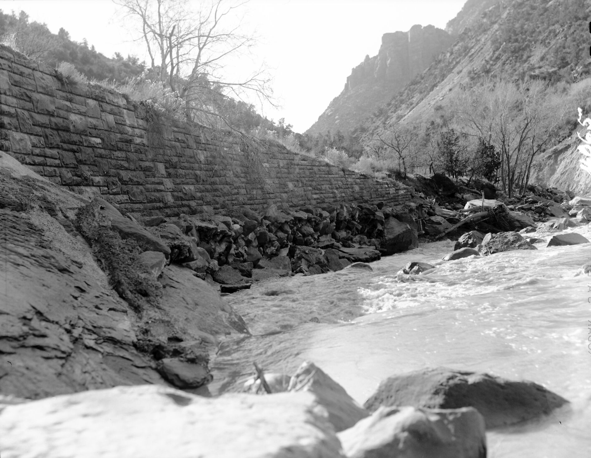 Flood damage - down-cutting of Virgin River near revetment.