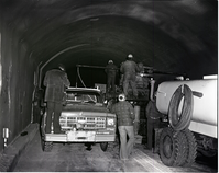 Machinery and crew drilling test cores in Zion-Mt. Carmel tunnel.