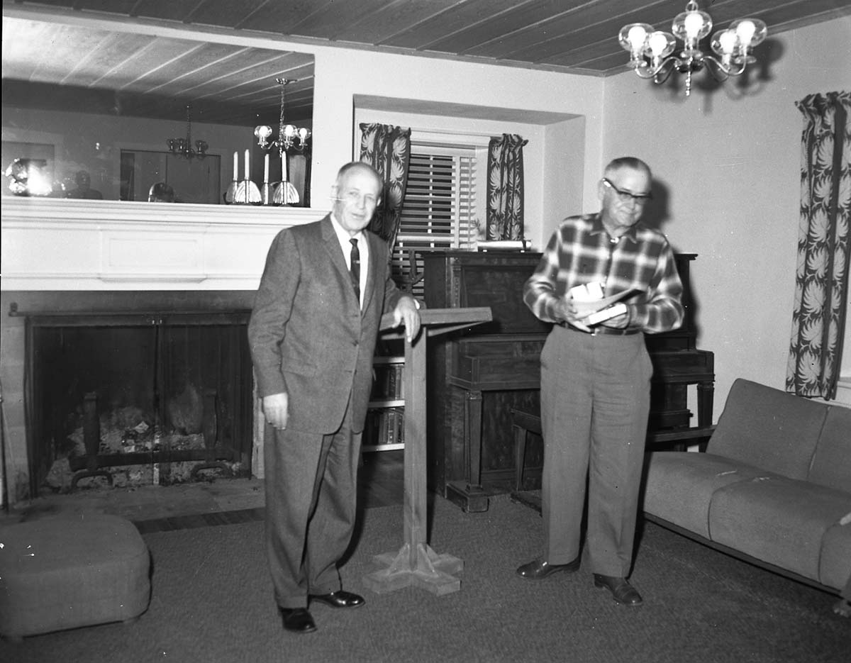 Retirement party for Arden Schieffer, Superintendent Frank R. Oberhansley presents award for meritorious service.