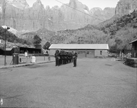 Crowd control training, shop area. Shows NPS personnel in riot gear.