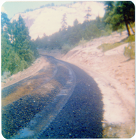 Asphalt along dirt road during road work along the Kolob Terrace Road.
