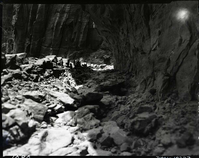 Damage done by storm of July 25, 1954 to West Rim Trail. Looking down last switchback leading into Refrigerator Canyon.