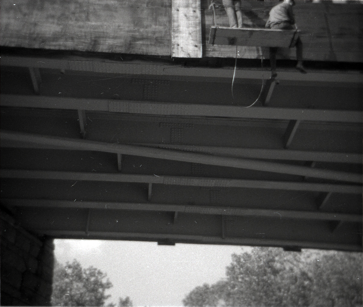 Men working on Canyon Junction vehicle bridge.