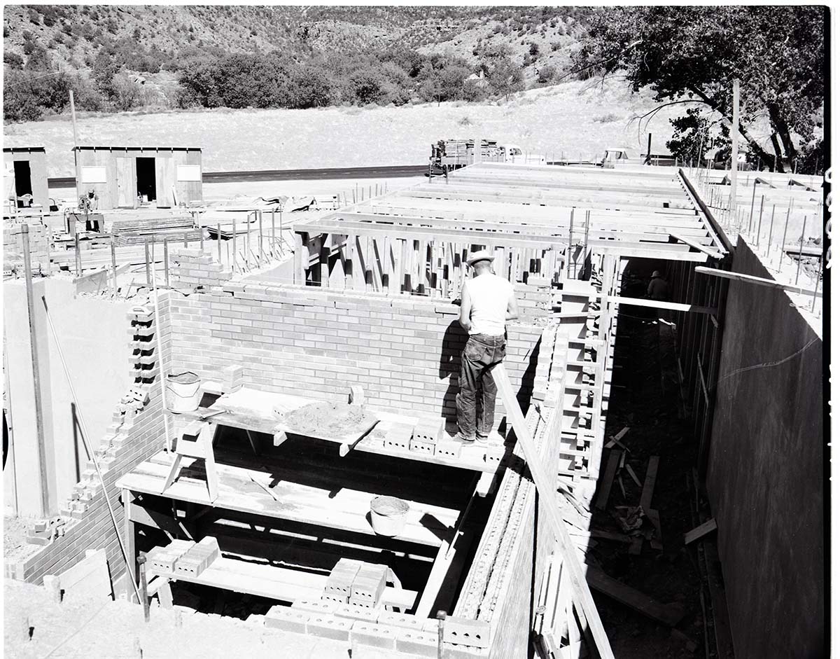 Laying brick of fireproof vault in basement of Mission 66 Visitor Center and Museum.
