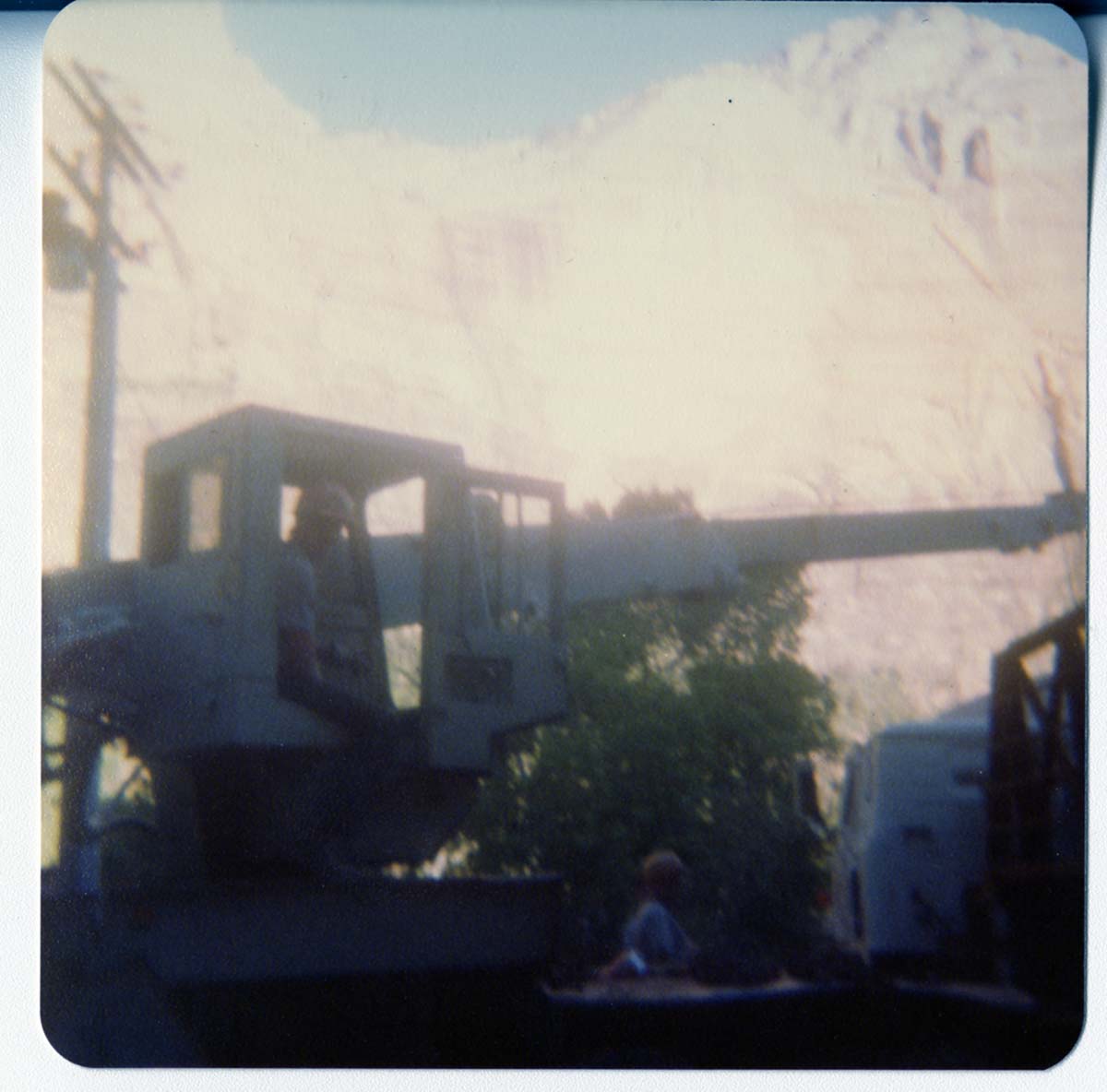 Man operating crane used to lift the new Grotto footbridge.