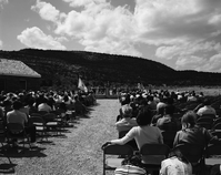 Man addressing visitors at the dedication of new Tribal and National Park Service Visitor Center and 50th anniversary at Pipe Spring National Monument.
