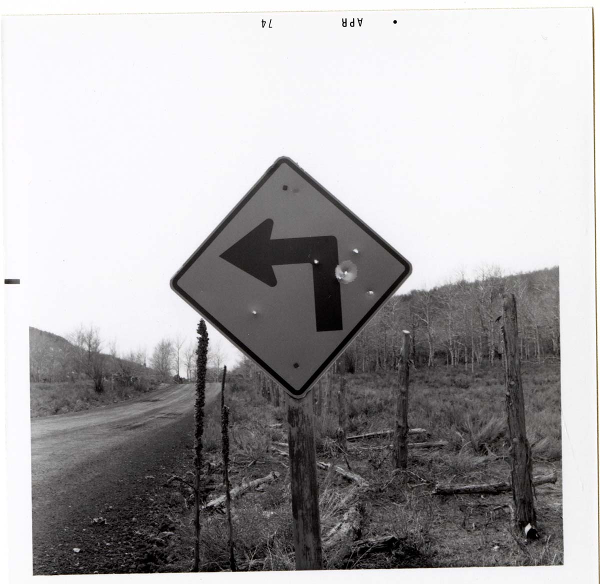 Left Turn Ahead' sign in Kolob Canyon.