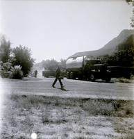 Construction vehicles and workers during Pipe Spring road construction activities.