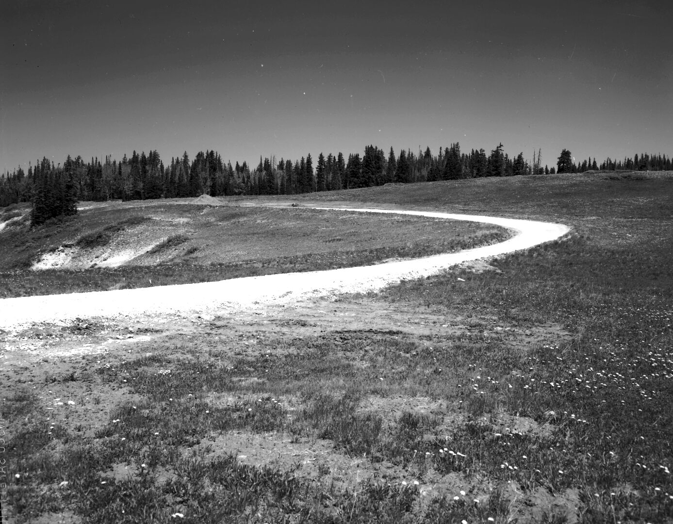 The start of road construction at east end of 1960 project. Taken as a record of the project.