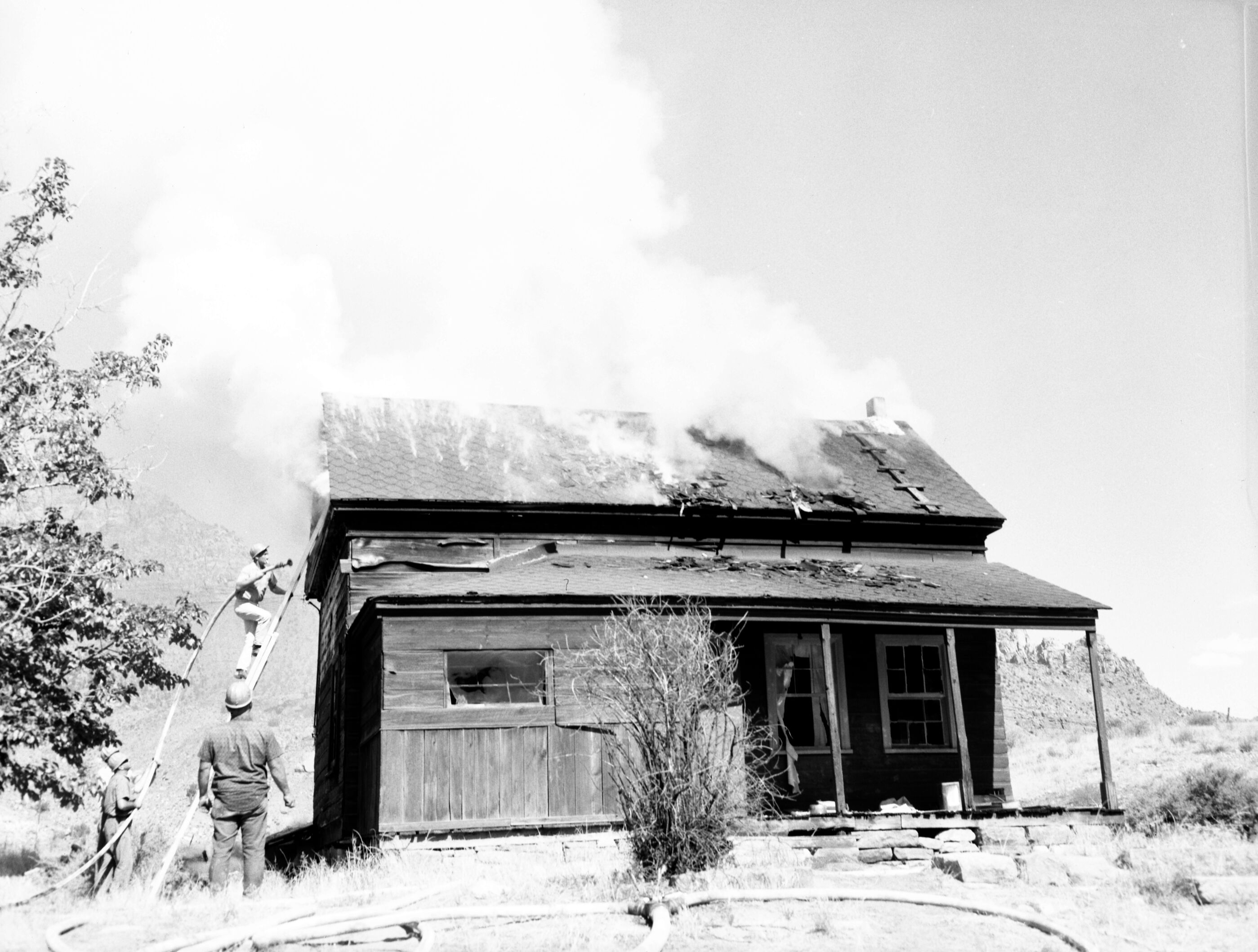 Fire prevention training; demonstration for students of Springdale school. Burning of old Justet home adjacent to Springdale school.