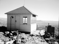 Fire lookout on Lava Point, Building 139 with view from point.