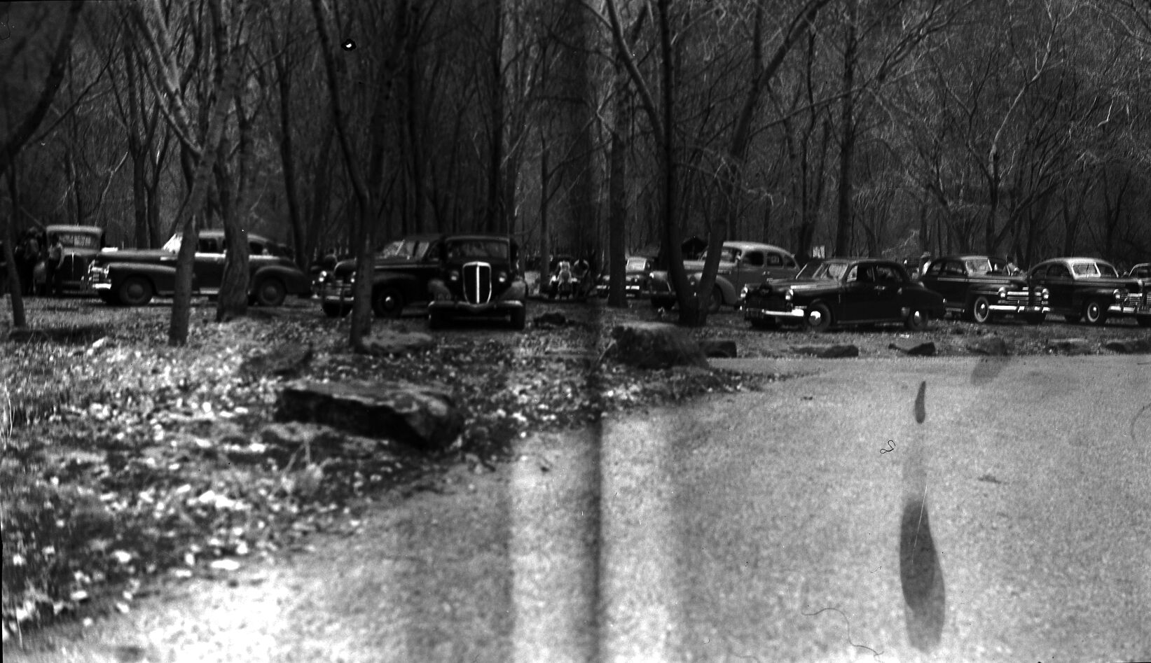 Visitor use - Easter Sunday weekend, many cars in parking lot at Grotto Campground.