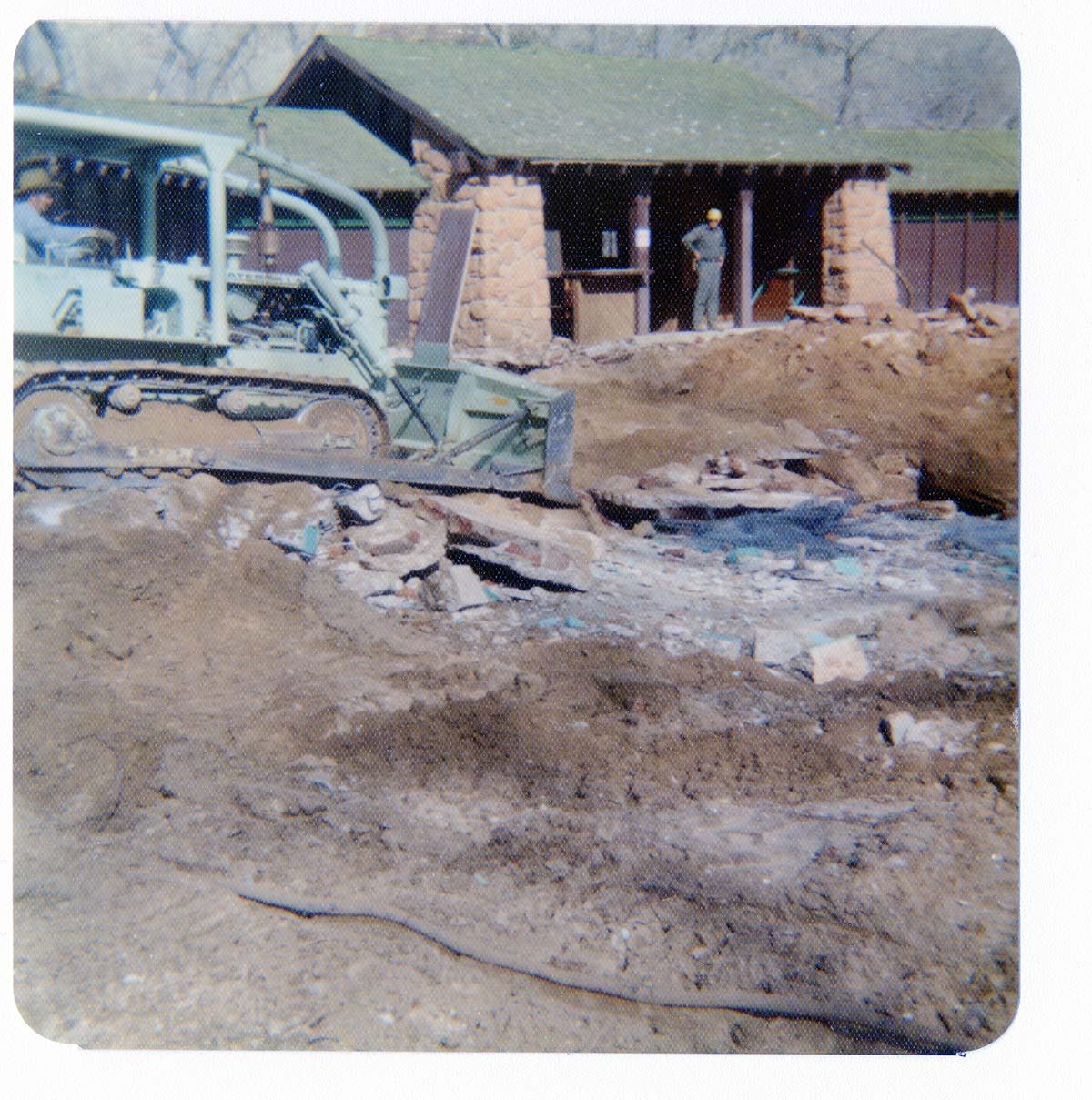 The destruction of the lodge pool and bathhouse.
