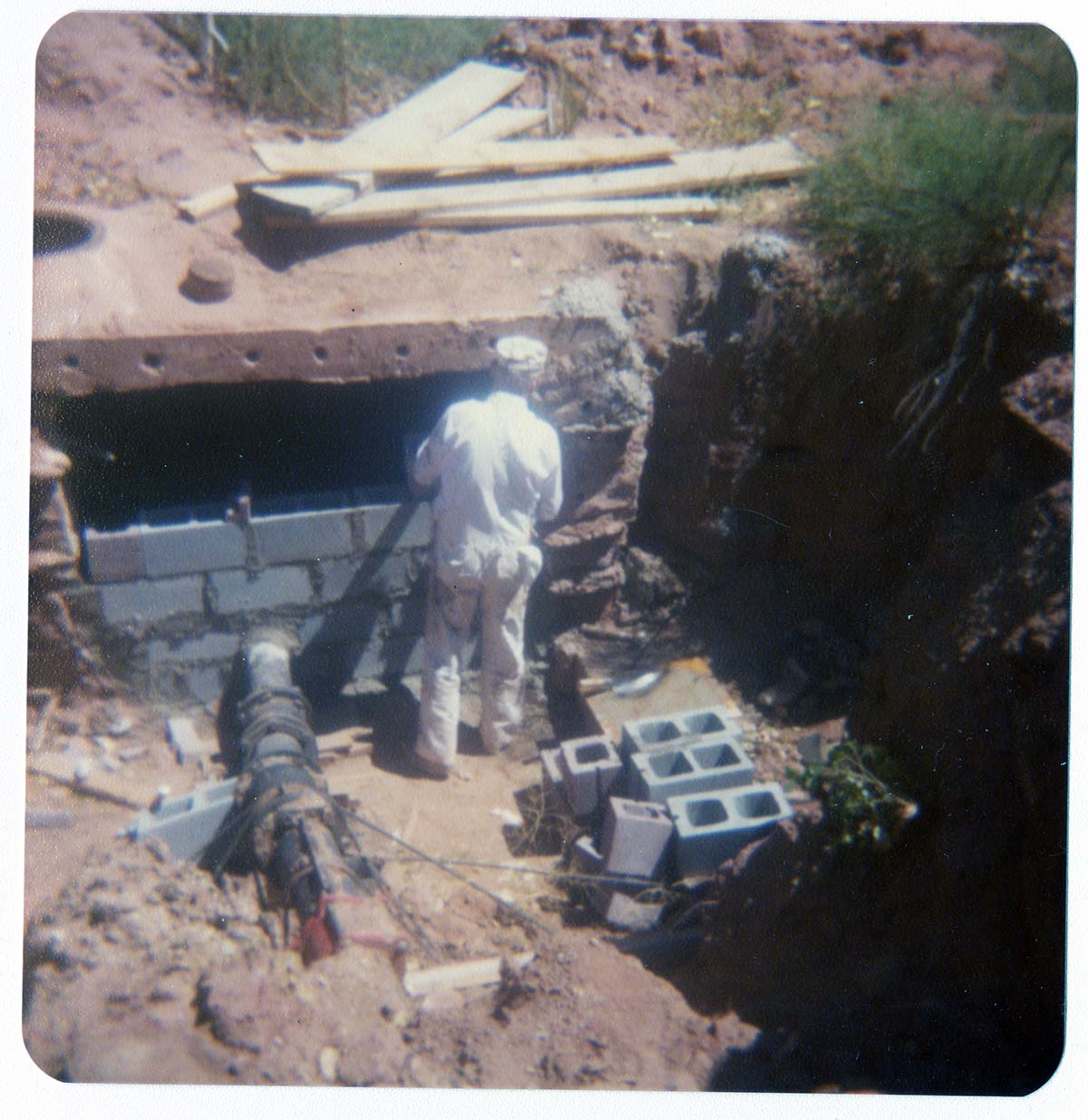 Men working on the construction of the Springdale water pipeline.