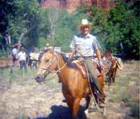 Horse pack-train heading for the East Rim for trail maintenance work.