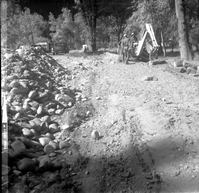 Road during construction and men working along the scenic canyon drive near the Grotto.