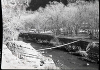 Old suspension bridge across Virgin River, West Rim Trailhead condemned by National Park Service Region 3 as unsafe for visitors.