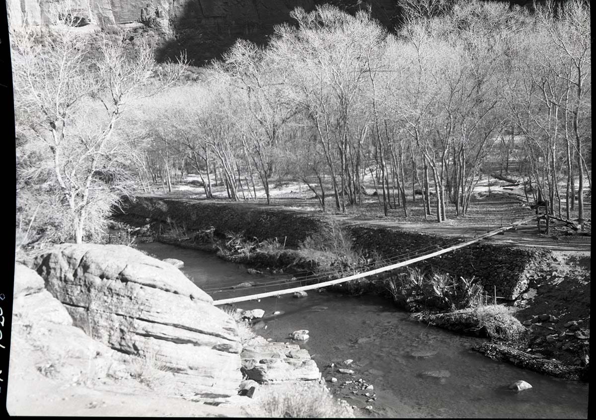 Old suspension bridge across Virgin River, West Rim Trailhead condemned by National Park Service Region 3 as unsafe for visitors.