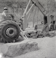 Man working excavator during road construction near the Temple of Sinawava.