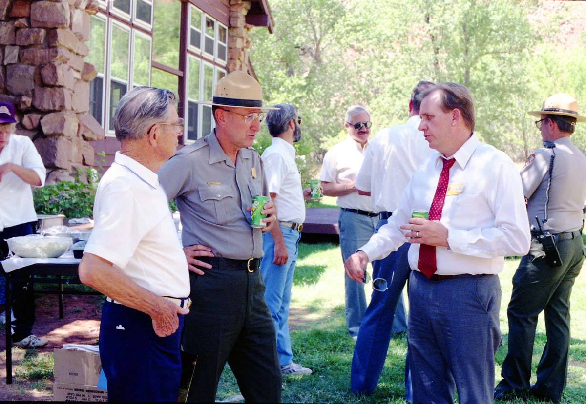 Color Photos of the parks 72nd anniversary celebrations- cake cutting, barbecue, speakers.