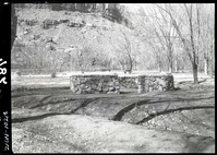 Enclosure for firewood in South Campground.