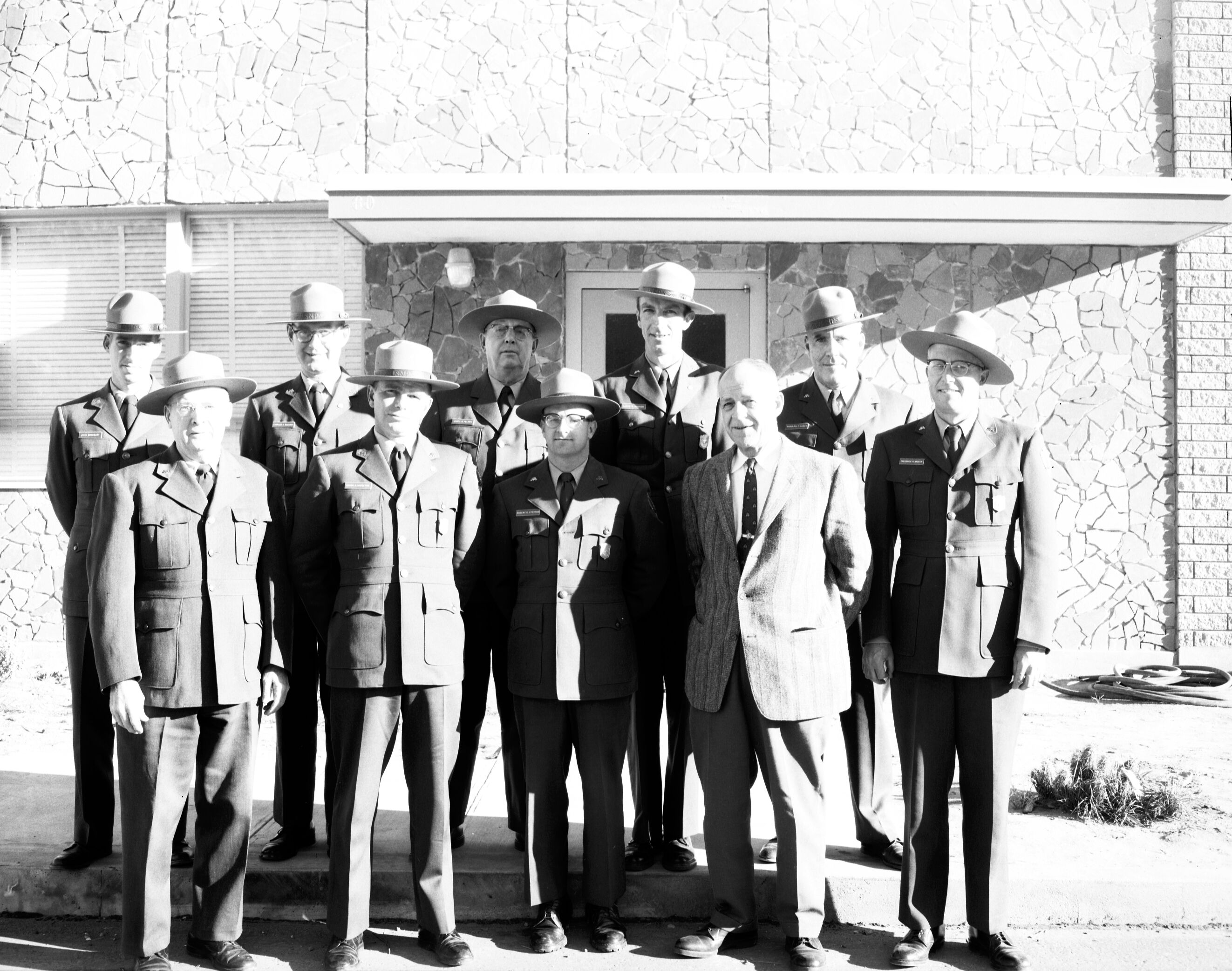 Ten uniformed personnel, in-service training. Left to right, back: John Bradbury, Charles H. McCurdy, James B. Felton, L. Hoener, Rudy Lueck; front: Carl E. Jepson, B. Hazeltine, R. Stevens, Superintendent Oberhansley.