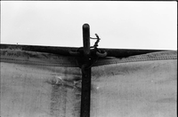 BW Photos of a close up of old tent hitching system.