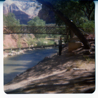 Man working on the emplacement of the Zion Lodge footbridge.