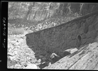 Rock retaining wall alongside the road at the slide area in Zion Canyon.
