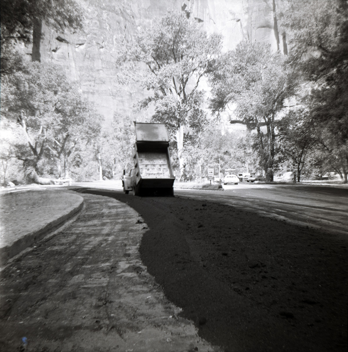 Construction truck working during resurfacing of roads in Zion.