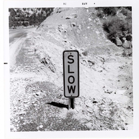 Road sign reading 'SLOW' in Kolob Canyon.
