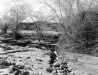 Flood damage - at outlet of sewage system from treatment plant near amphitheater of Watchman campground.