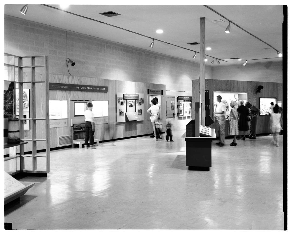 Visitors viewing the interpretive displays in the old Mission 66 Visitor Center and Museum.