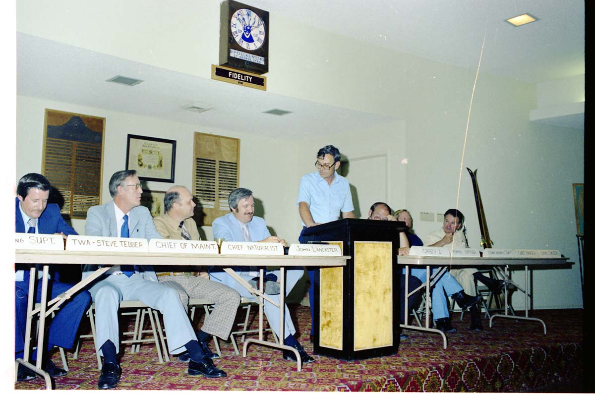 Color Photos of John Lancaster's farewell party at Elks Club in St. George, Utah. Speakers at roast in front of room: Pipe Spring National Monument Superintendent, TWA Steve Tedder, Chief of Maintenance, Chief Naturalist, John Lancaster, Crazy D, Administrative Officer, Cedar Breaks National Monument Superintendent, Chief Ranger, Unknown Skier.