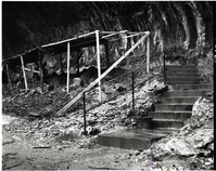 Repair of Weeping Rock Trail with concrete steps and stone work in foreground.
