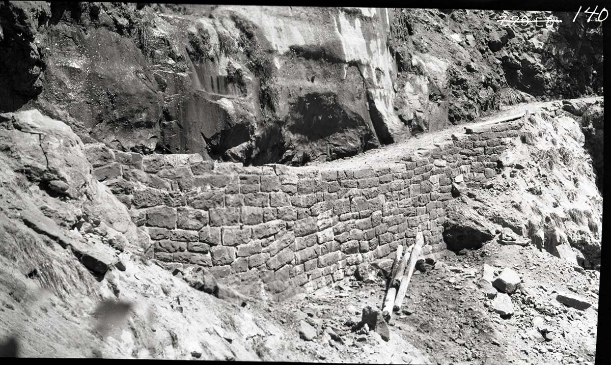 Narrows Trail construction, view is of the completed cement and rubble masonry wall at station 30-60.