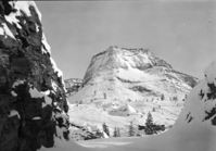 Checkerboard Mesa with the Zion-Mt. Carmel Highway in foreground.