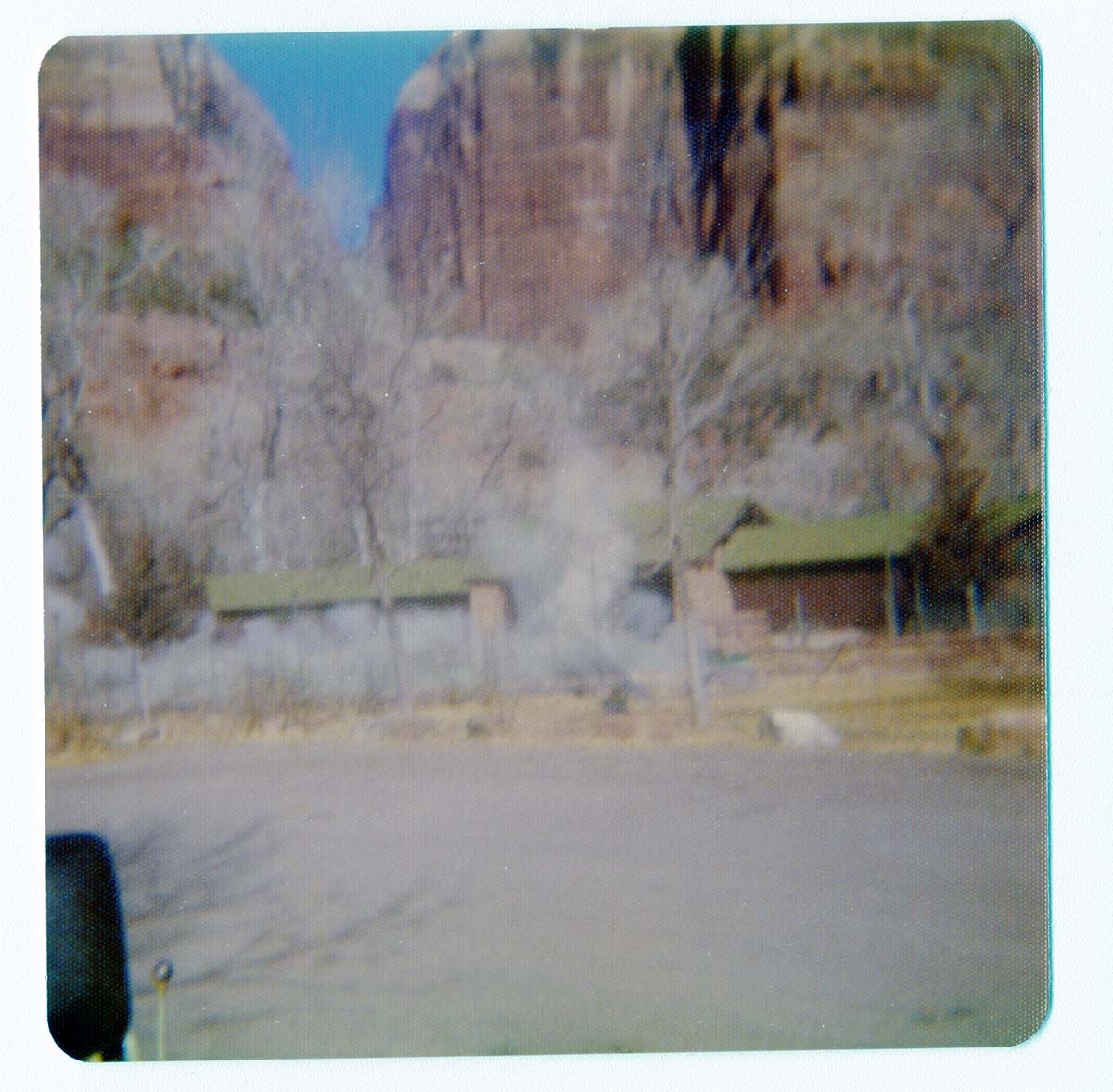 Cloud of dust from the destruction of the lodge pool and bathhouse.