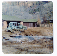 The destruction of the lodge pool and bathhouse.
