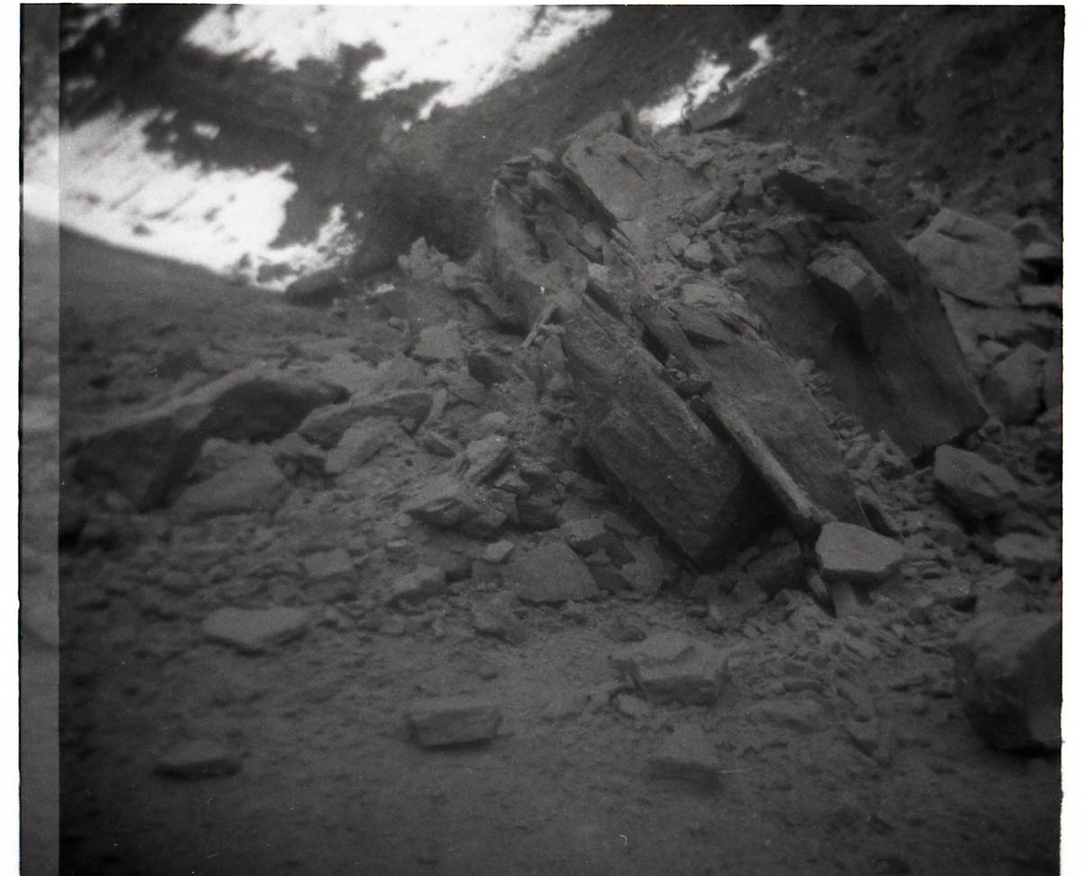 BW Photo of a rock slide along Route 2 - 110mm.