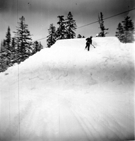 BW Photos showing rangers digging out the visitor center from snowdrift.