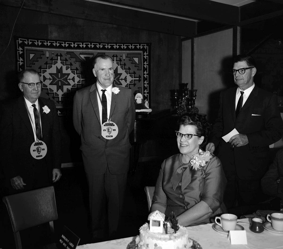 Retirement party for Carl E. Jepson and Rudy Lueck at Grandma's Kitchen. Left to right: Carl E. Jepson, Rudy Lueck, Eulah Lueck, Warren Hamilton.