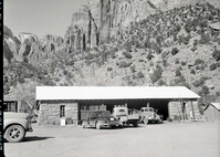 Reconstruction of machine shop, Building 77 after fire of January 3, 1953. Roof has been restored, but doors remain to be rebuilt.