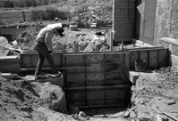 Man worker during construction of headquarters addition.
