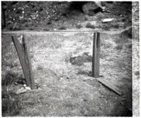 BW Photo of a rock slide along Route 2 - 110mm. Sign damage.